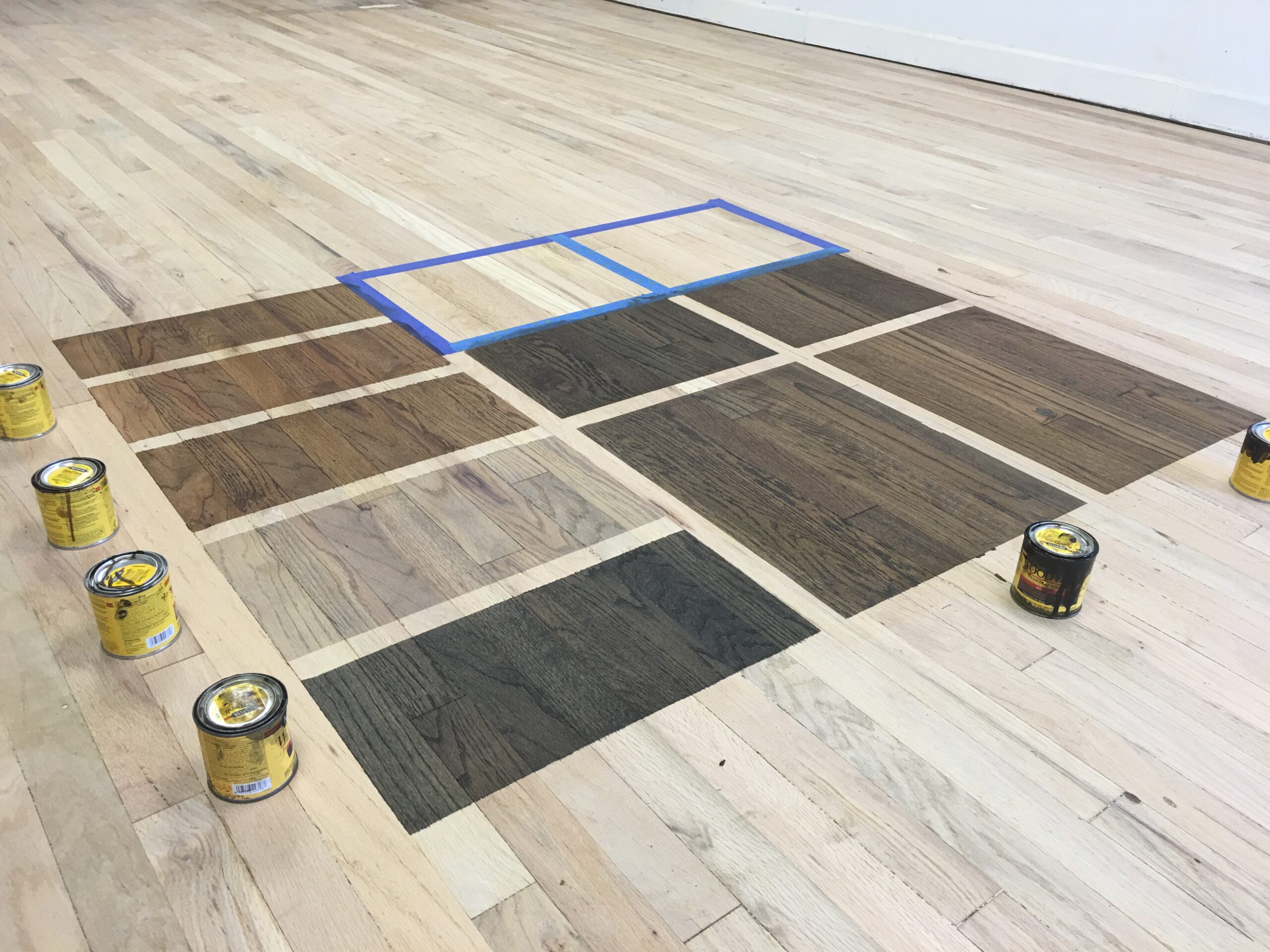 https://a1hardwoodflooring.com/wp-content/uploads/2024/01/staining-floors-scaled.jpeg